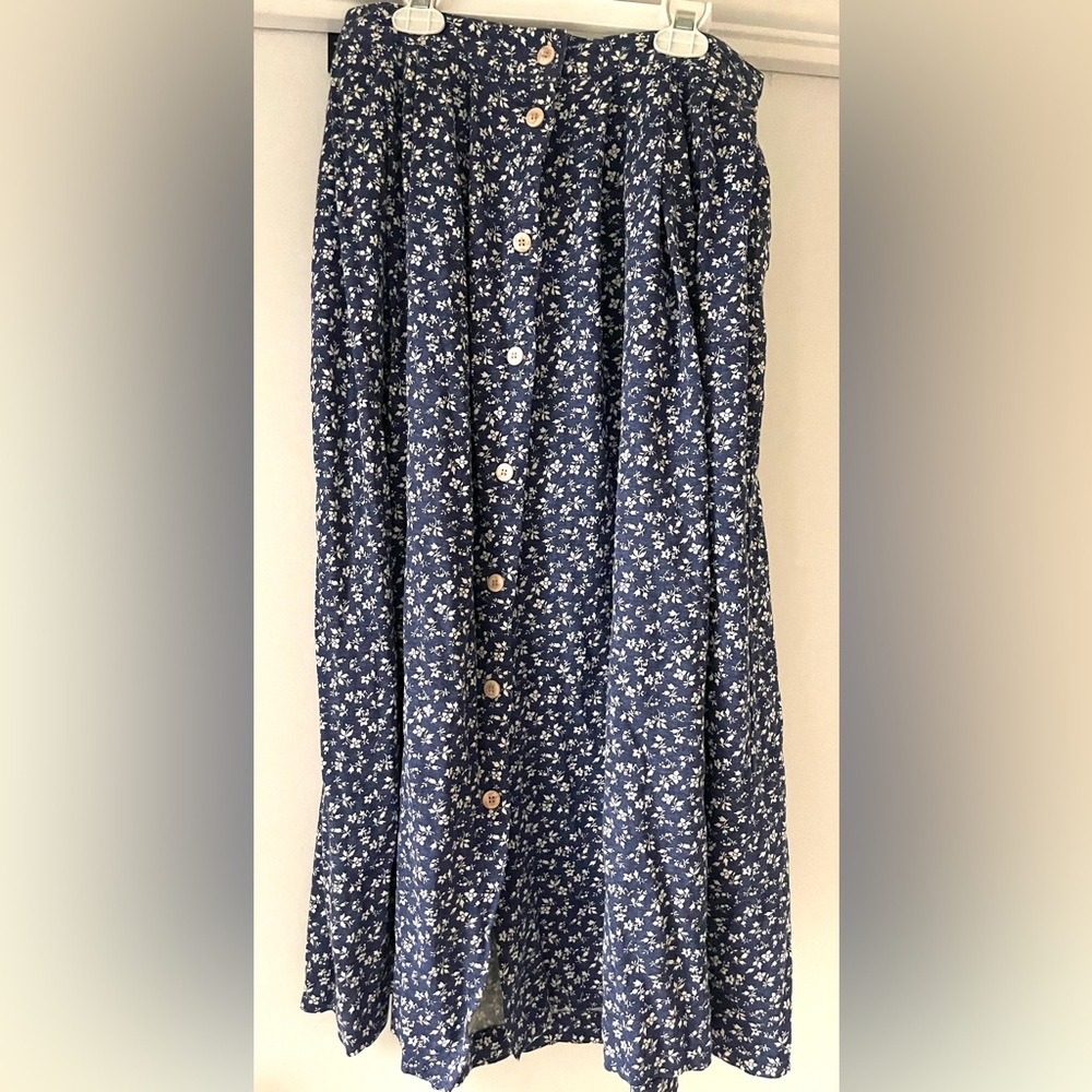 Blue skirt with flowers and buttons down the front